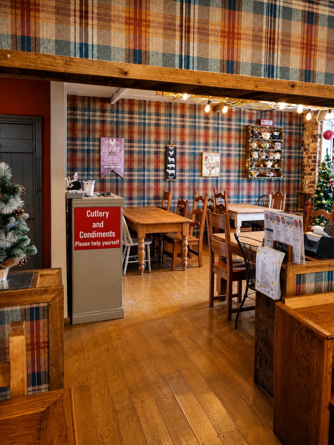 The plaid-lined dining room inside The Dairy Barn tea room